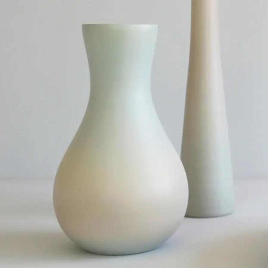 Exclusive Rina Menardi Lepos vase crafted in muted grey ceramic with a smooth matte finish and rounded form