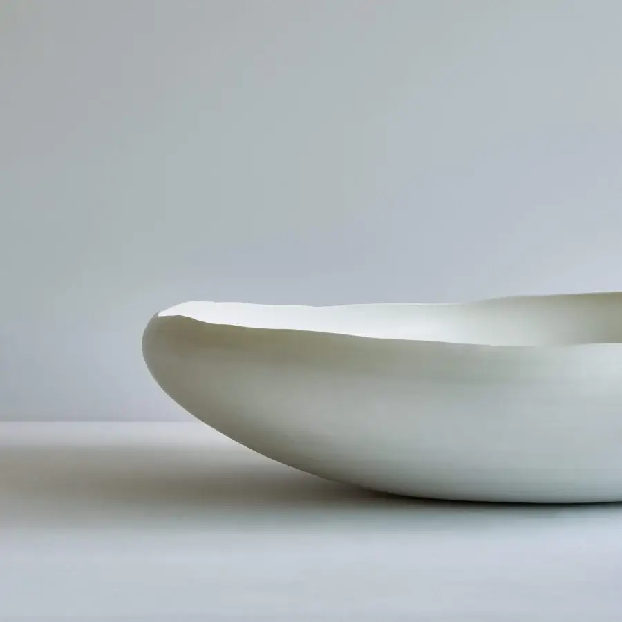 Distinguished Rina Menardi Luna centerpiece crafted in Italy with pale grey-green and a smooth satin finish