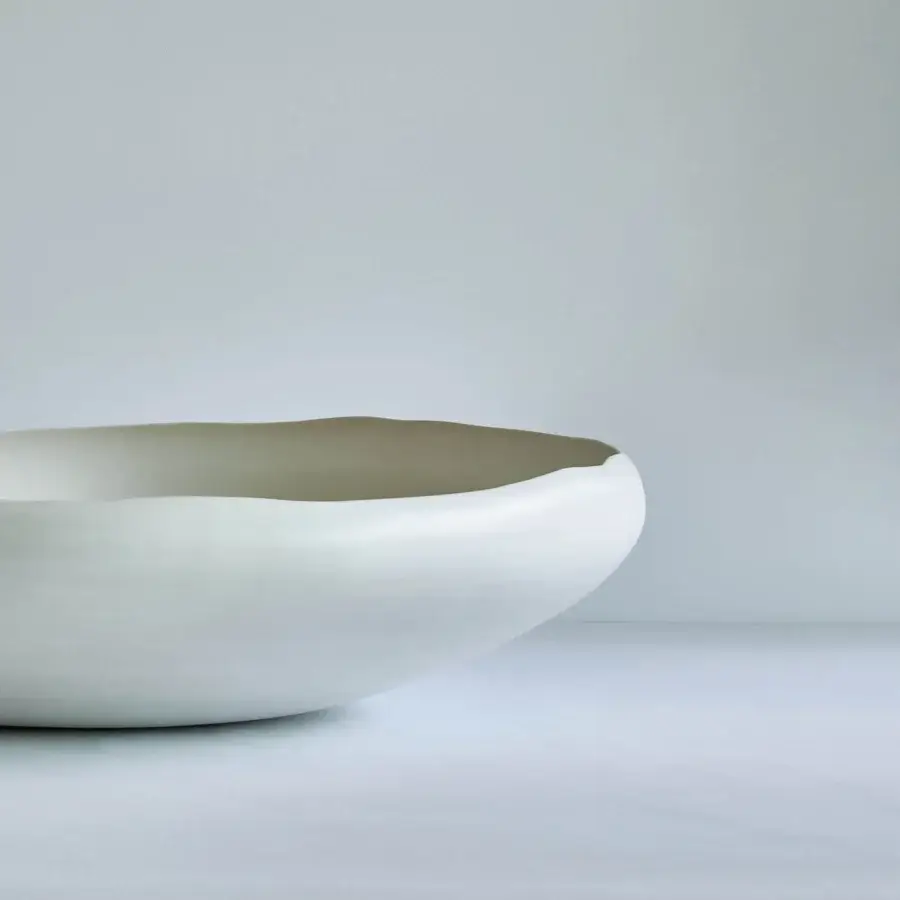 Exceptional Rina Menardi Luna centerpiece sculpted with an organic form in matte ceramic with off-white and beige tonal variations