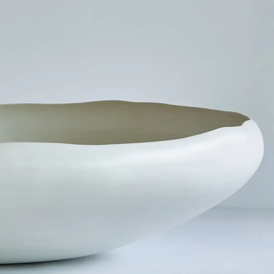 Distinguished Rina Menardi Luna centerpiece crafted in pale off-white ceramic with a matte finish and subtle beige undertones