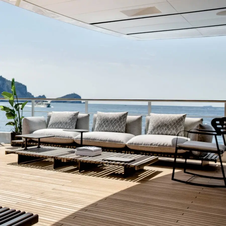 Elegant Giorgetti Apsara sofa crafted with carob powder-coated aluminum, Afrormosia wooden slats, and light-grey waterproof upholstery