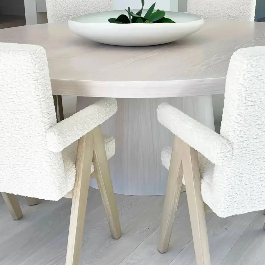 Exclusive Rina Menardi Luna centerpiece crafted in Italy with satin wood and tactile off-white bouclé upholstery