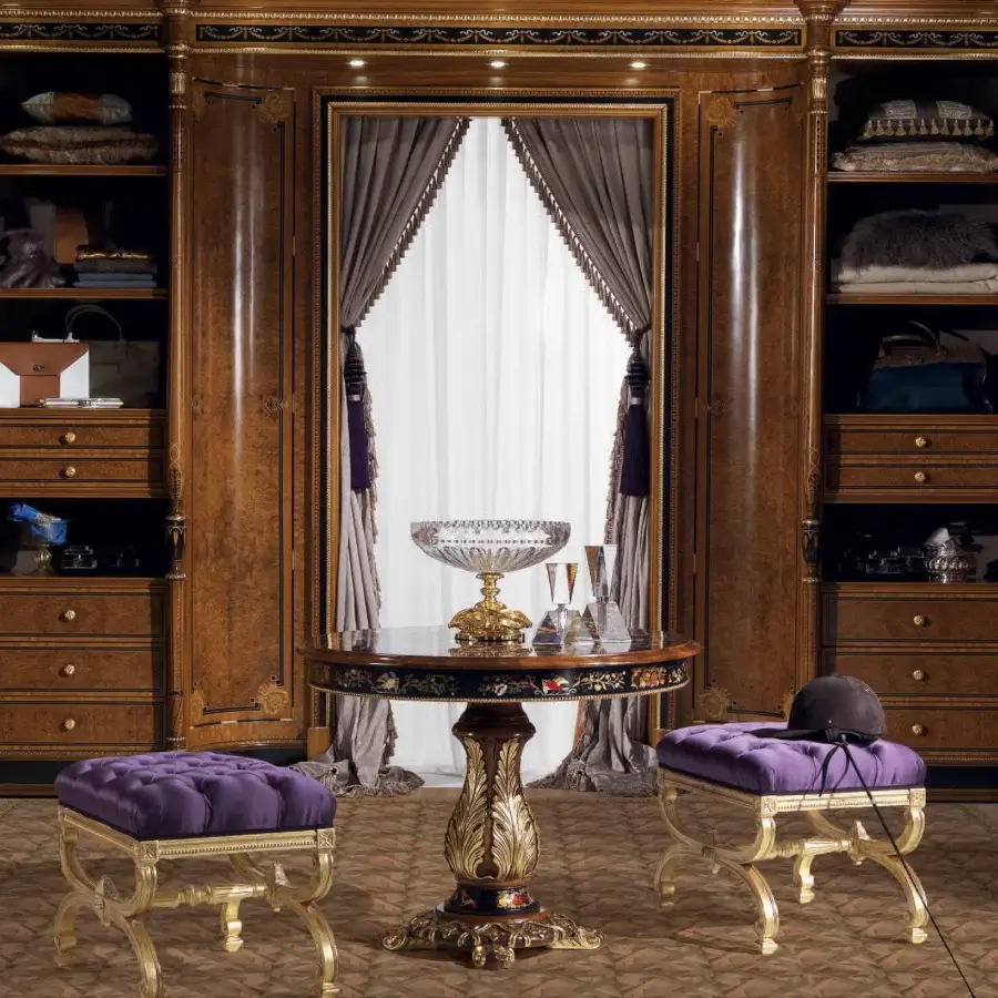 Distinguished Armando Rho A1190 ottoman crafted in deep purple textile with luminous gold leaf finish