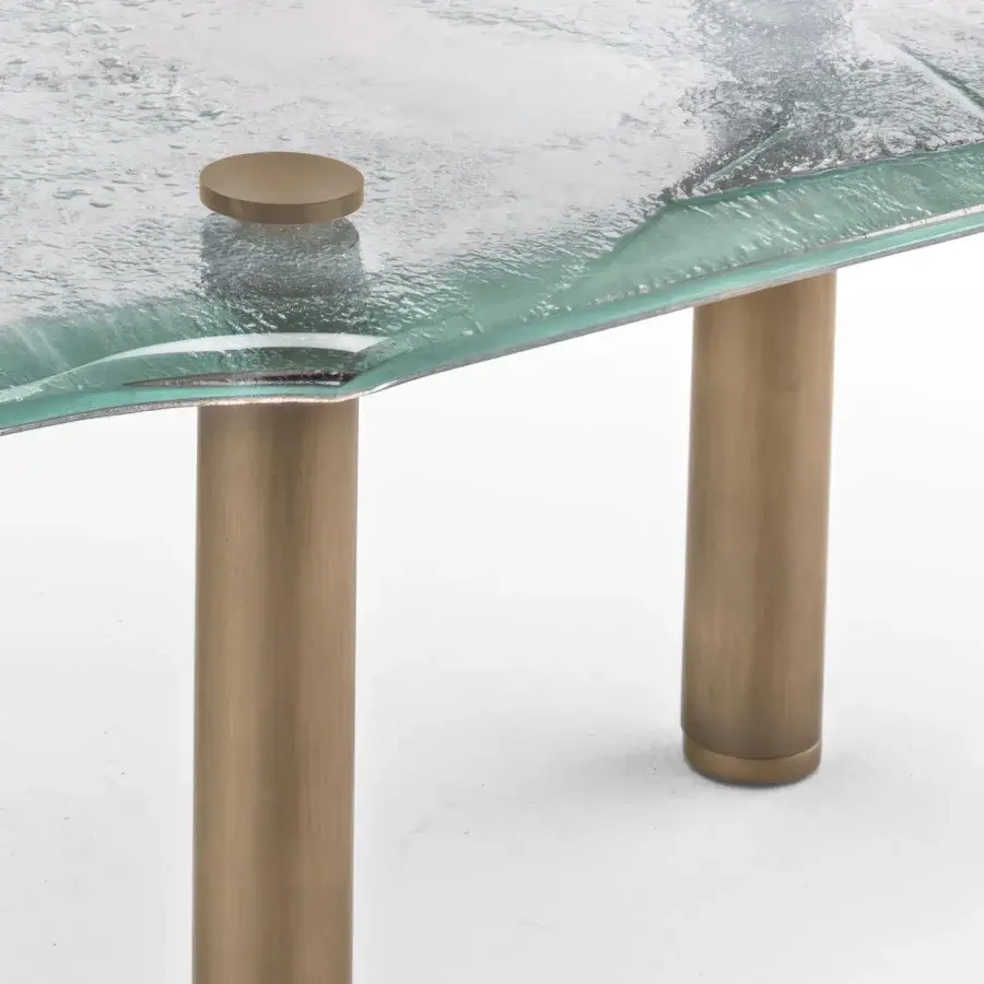 Lavish Arte Veneziana Anzoleto coffee table built with layered baked glass transitioning from clear to greenish hues and burnished brass legs