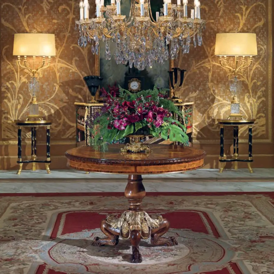 Distinguished Armando Rho A1244 foyer table crafted in walnut burl, myrtle burl and vavona burl veneers with gold leaf accents and glossy finish