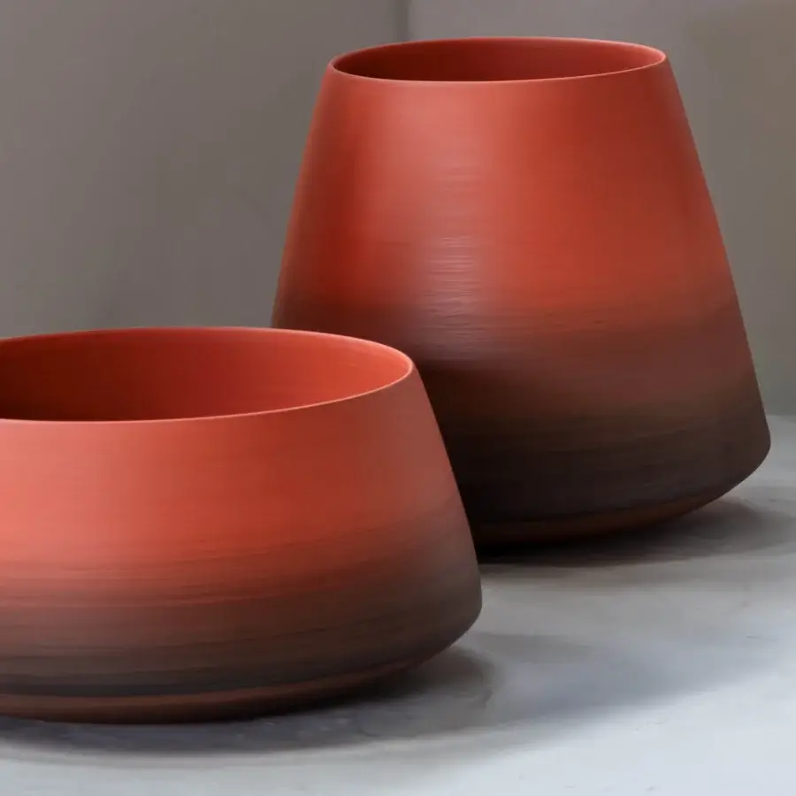 Exceptional Rina Menardi Mono Vases, decorative vessels crafted in Italy with muted reddish-orange terracotta and matte finish
