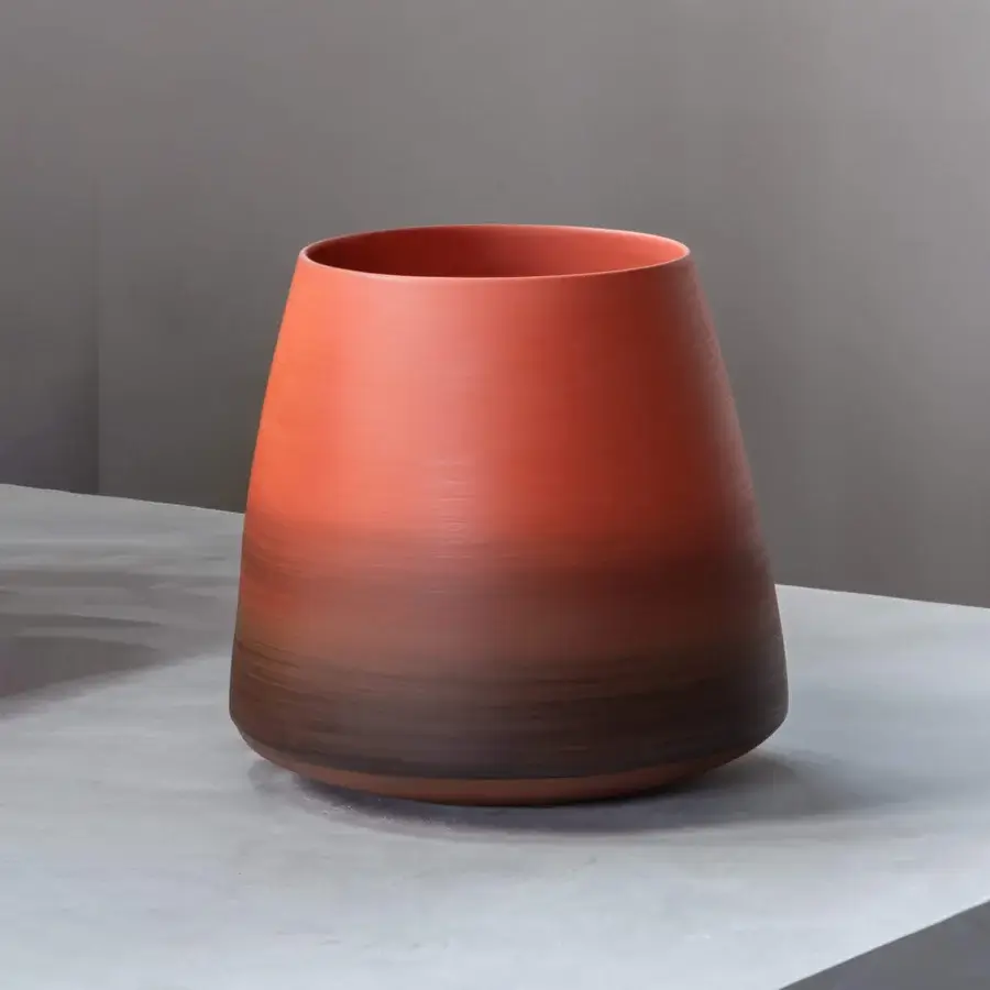 Distinguished Rina Menardi Mono Vase, ceramic piece crafted in Italy with a reddish-orange to brownish-red gradient and smooth matte finish