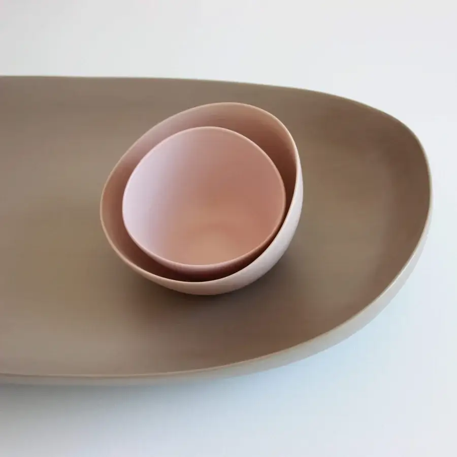 Exceptional Rina Menardi Nidi vase set crafted in ceramic with a soft matte finish and muted rose pink tonal variations