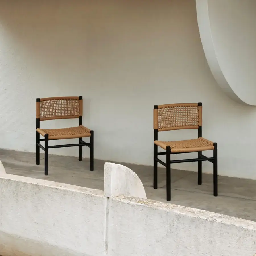 Sophisticated Billiani Harry’s chair crafted from Iroko or Ashwood with a dark matte finish and woven seat backrest