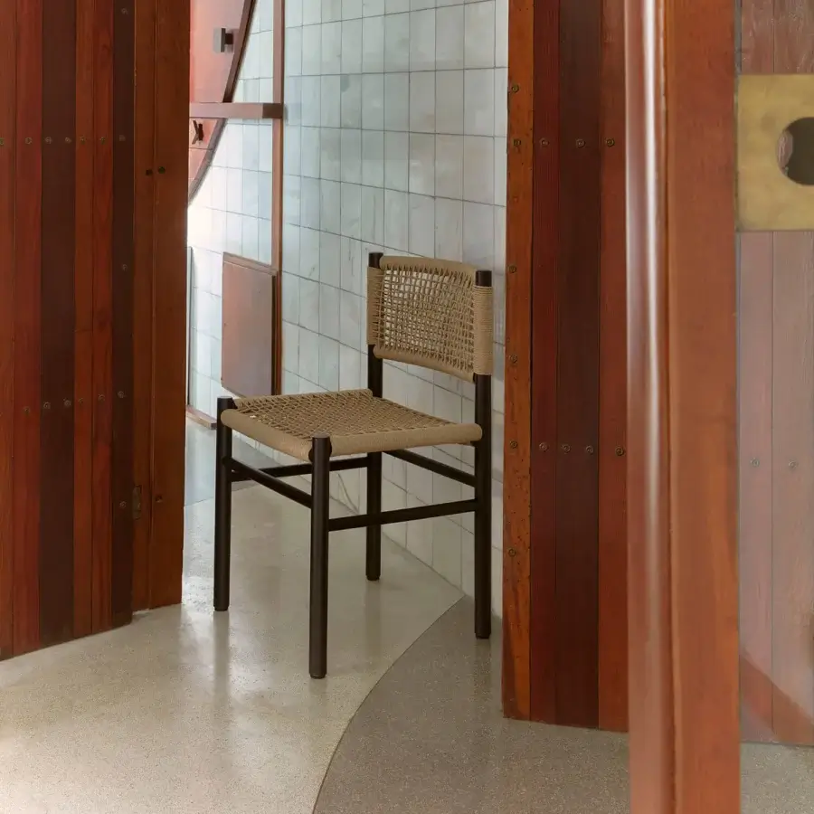 Distinguished Billiani Harry’s dining chair crafted from Iroko wood with satin finish and light beige hand-woven cord seat and backrest