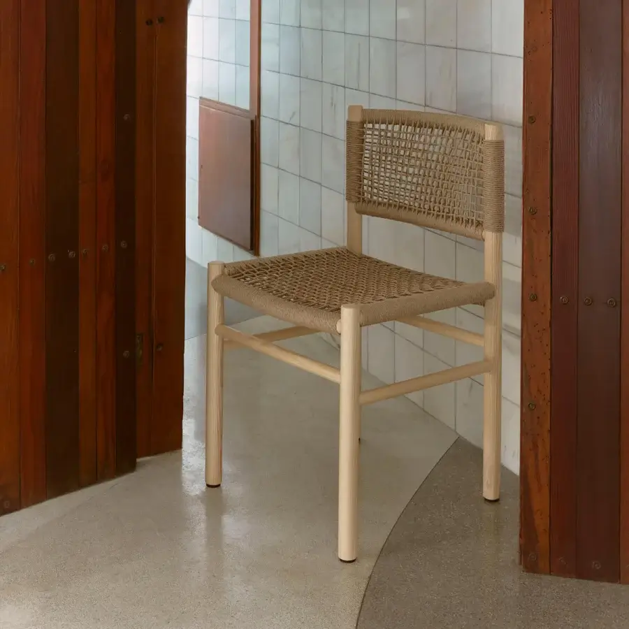 Exceptional Billiani Harry’s dining chair crafted from Iroko or Ashwood with a smooth matte finish and woven light beige detail