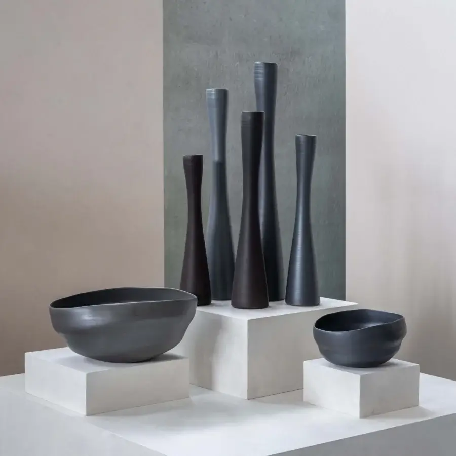 Exceptional Rina Menardi Noci vase sculpted from smooth wood with matte finish embodying a minimalist aesthetic