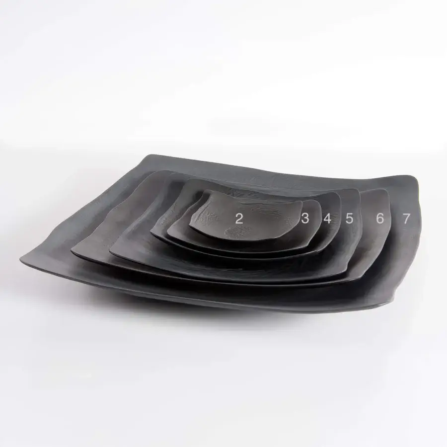 Exclusive Rina Menardi Quadri centerpiece crafted in dark-toned wood with a matte finish and flowing organically shaped silhouettes