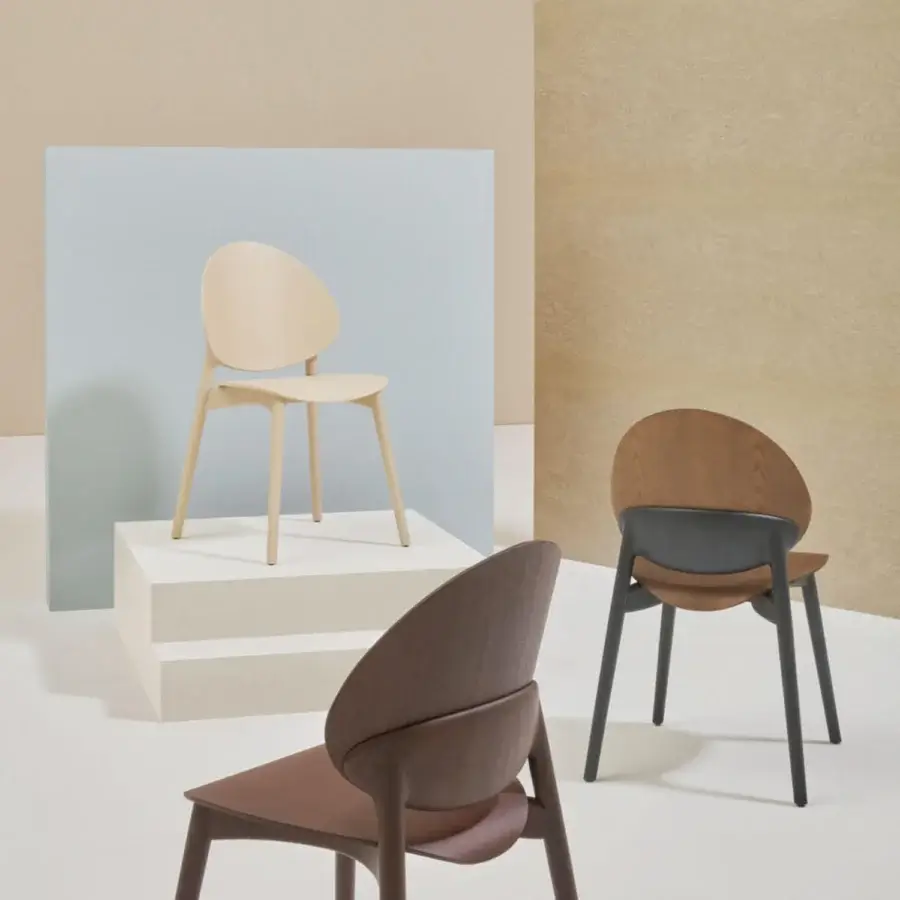 Distinguished Billiani Fleuron dining chair with reddish-brown wood frame and sculpted backrest showcasing visible grain