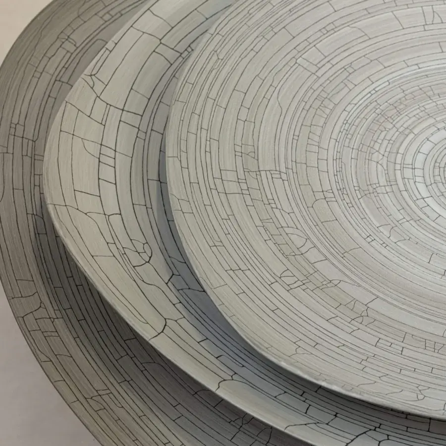 Distinguished Rina Menardi Triangolo centerpiece, a handcrafted Italian arrangement in muted gray ceramic with a captivating cracked glaze