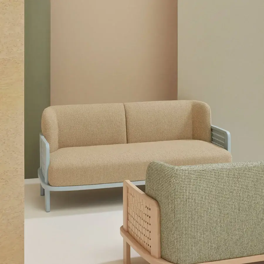 Distinctive Billiani Raquette sofa crafted in Italy with woven light tan fabric and muted blue-grey metal legs