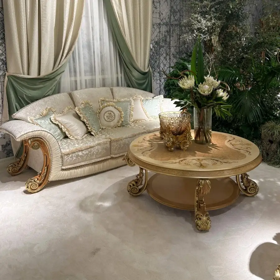 Superior Riva Mobili D'Arte 22274 coffee table crafted in Italy with creamy beige hardwood, hand-carved floral details and gold-toned embellishments with a high-gloss polish