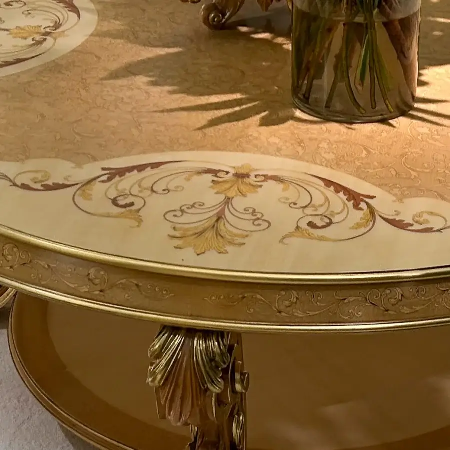 Exquisite Riva Mobili D'Arte 22274 coffee table handcrafted in Italy with golden-yellow finish and ornate floral motifs