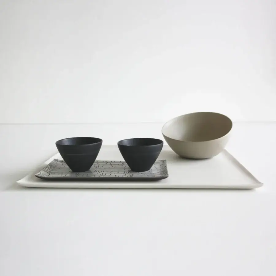 Exclusive Rina Menardi Vassoi Rettangolari centerpiece tray in light gray ceramic with dynamic black and white patterning and smooth matte finish