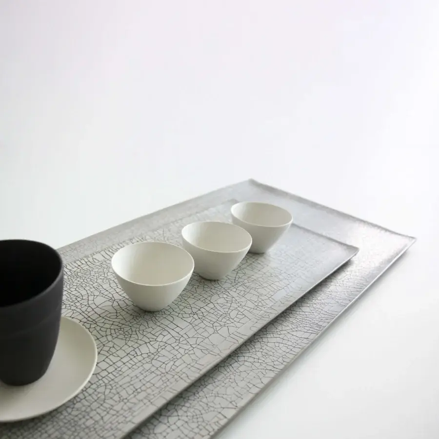 Exclusive Rina Menardi Vassoi Rettangolari centerpiece tray crafted in metal with a cracked muted gray mosaic surface