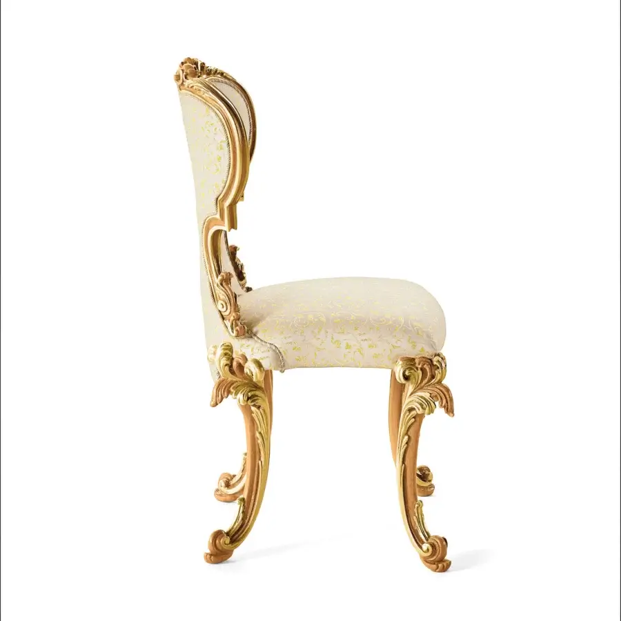 Lavish Riva Mobili D'Arte 22120 chair crafted in gold with pale yellow and cream patterned upholstery and carved hardwood