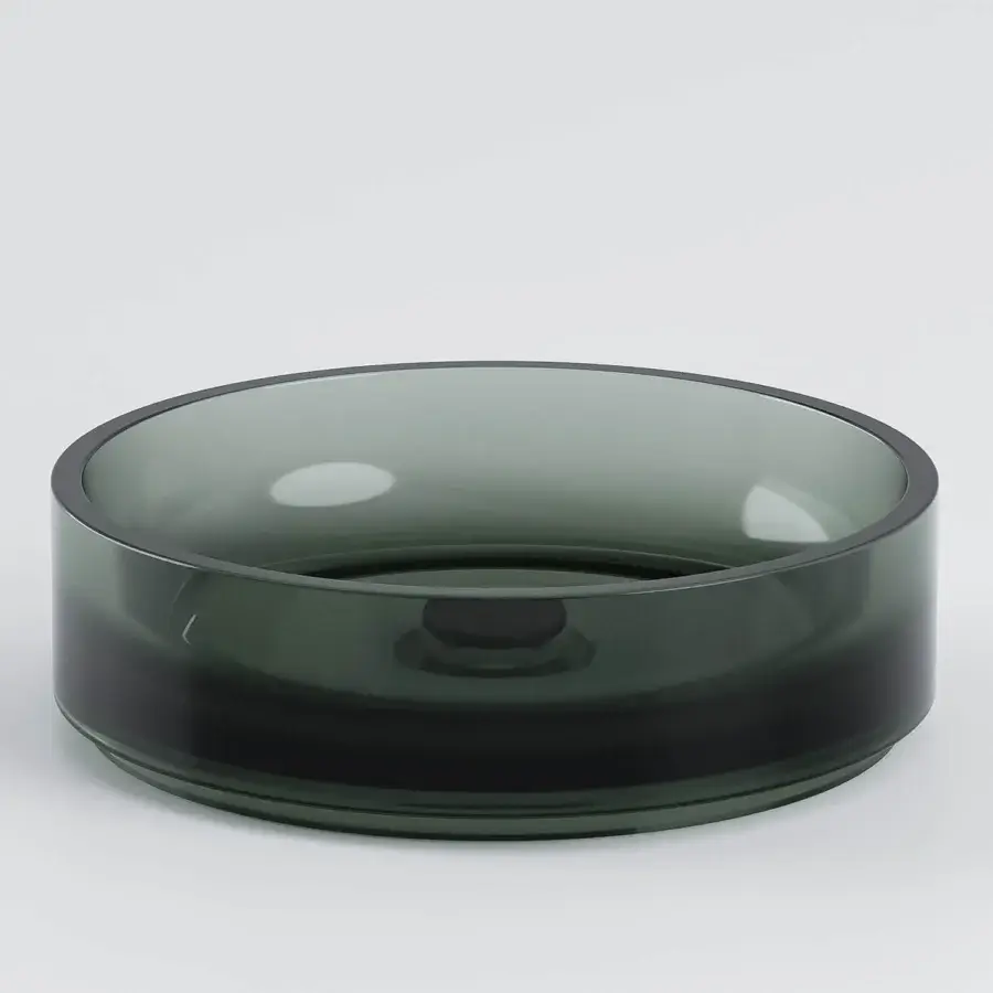 Distinguished Norah Design ISBA 01 washbasin with a low circular silhouette in dark green-grey Norahcrystal and smooth glossy finish