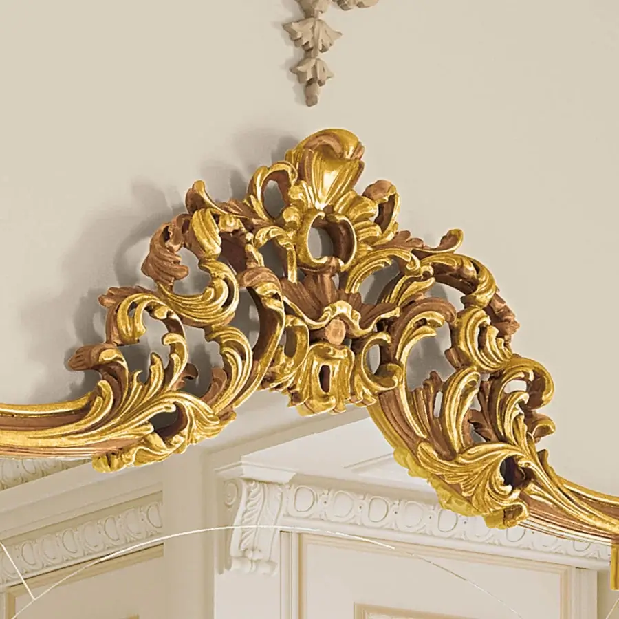 Lavish Riva Mobili D'Arte 22057 mirror crafted in gilded wood with deeply carved floral motifs and a glossy finish