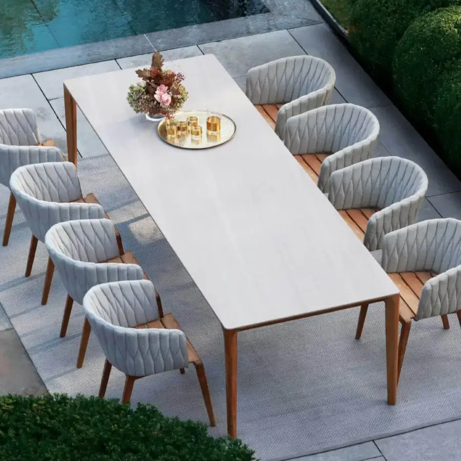Exceptional Royal Botania U-nite table with light rectangular top and sturdy teak base in a smooth matte finish