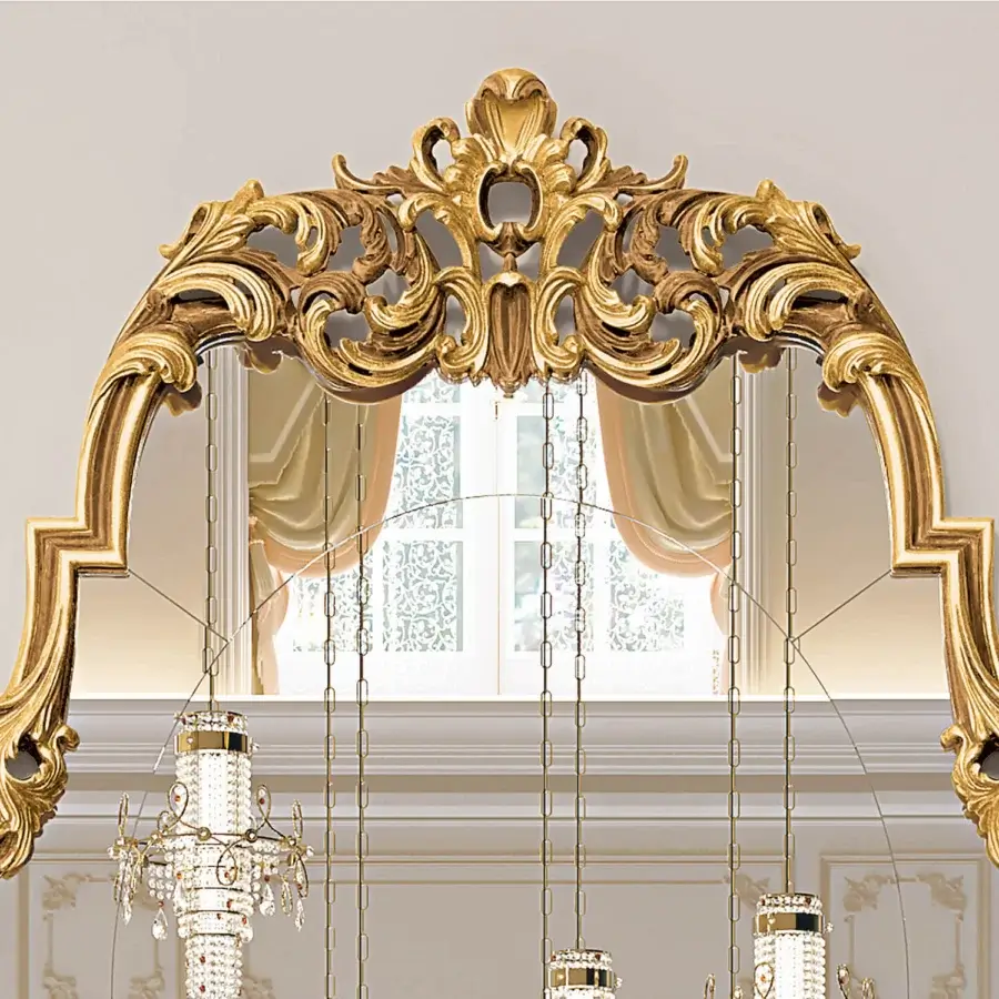 Exceptional Riva Mobili D'Arte 22056 mirror crafted in wood with elaborate botanical relief and glossy gold tone finish