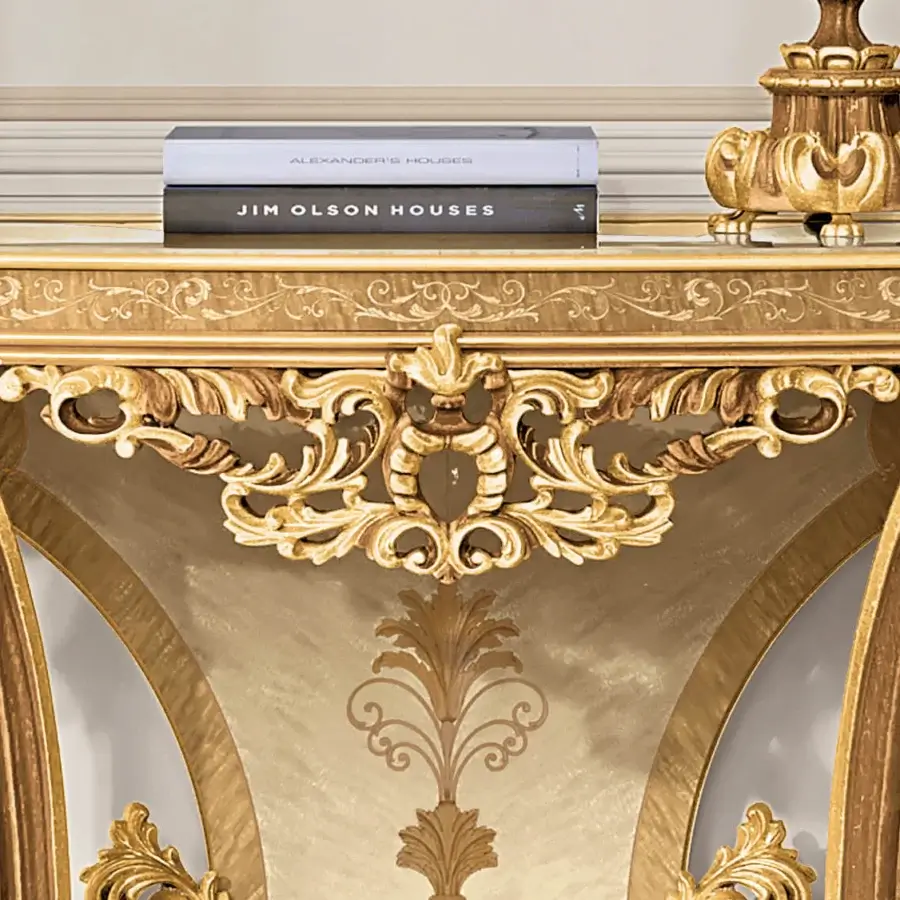 Superior Riva Mobili D'Arte 22055 console crafted in gold tone with sinuous form and hand-carved scrolling foliage