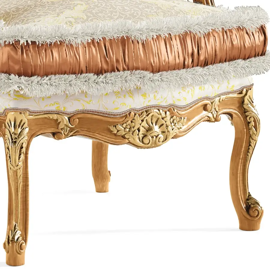 Distinguished Riva Mobili D'Arte 6823 lounge chair crafted with gilded wood, floral motifs, and gold cream patterned textile upholstery with white trim