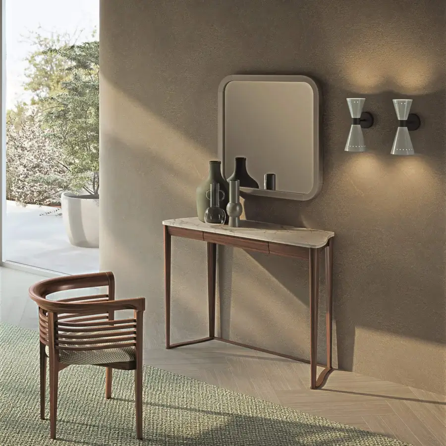 Elegant Carpanelli Dolfin chair built in solid ash wood with a woven seat and smooth satin finish