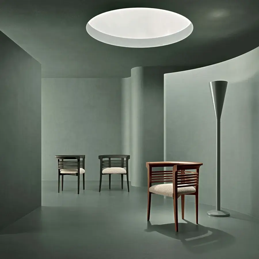 Distinguished Carpanelli Dolfin chair built with solid ash wood, a walnut tone finish, and a neutral woven textile seat