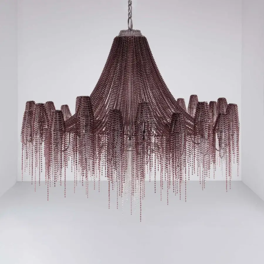 Exquisite Patrizia Garganti Burlesque chandelier with cascading clear strands and reddish-purple accents in a dark matte metallic frame