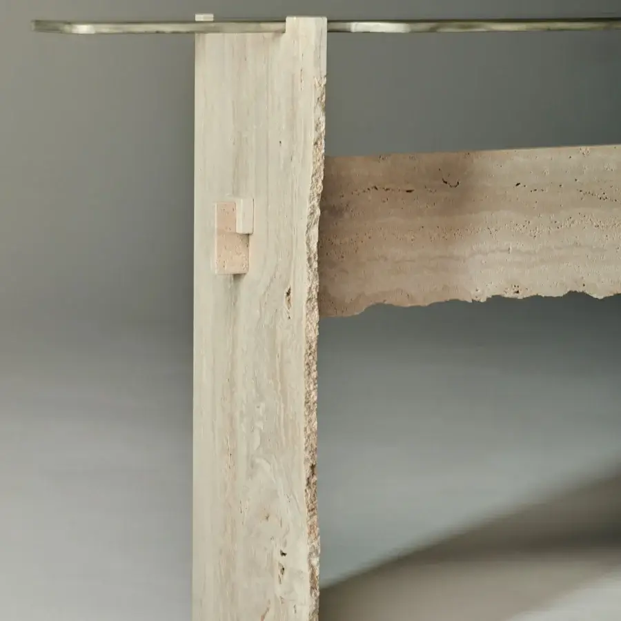 Distinguished Arte Veneziana Barco console crafted with warm beige travertine marble and luminous extra-clear glass with Miage finish