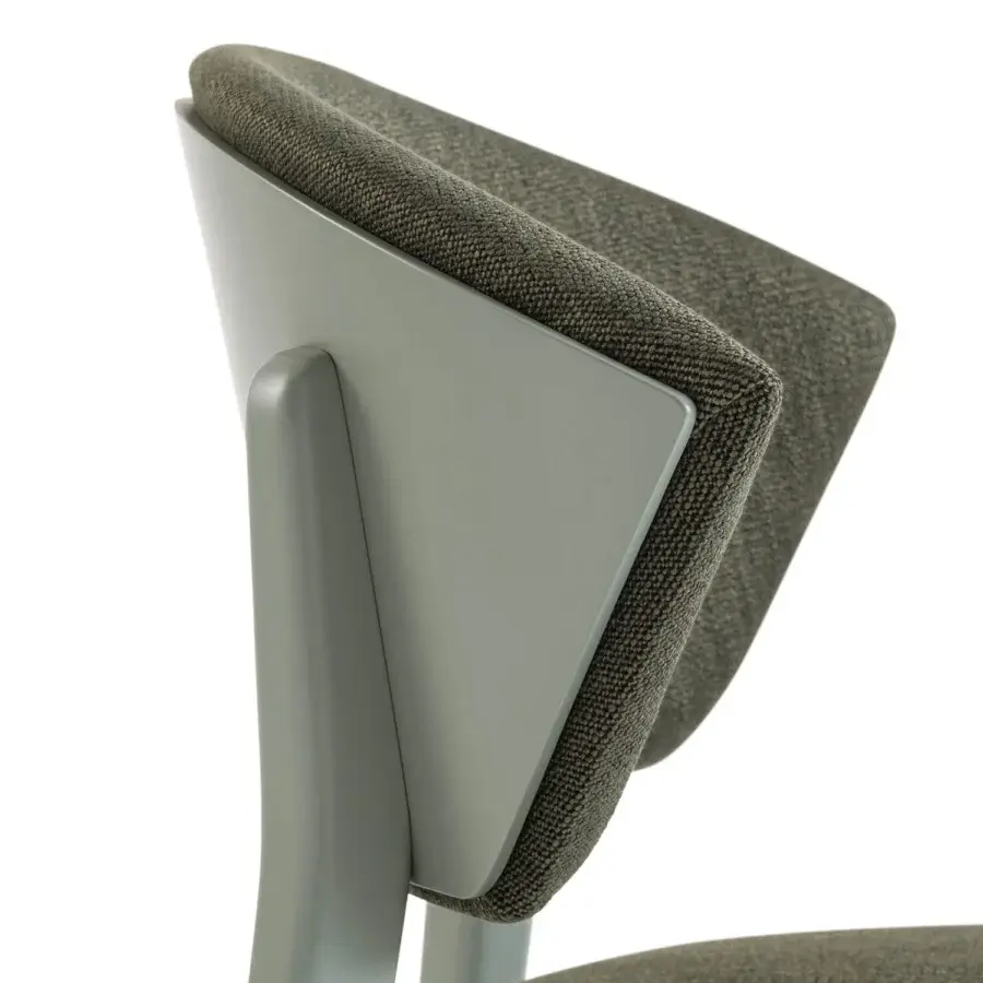 Distinguished Billiani Stella dining chair with matte sage green shell and dark grey woven textile upholstery crafted in Italy