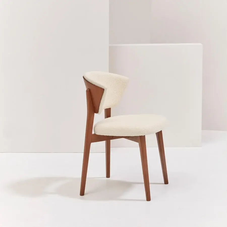 Distinguished Billiani Stella dining chair in cream textile upholstery with satin-finish wood frame and star-inspired backrest detailing