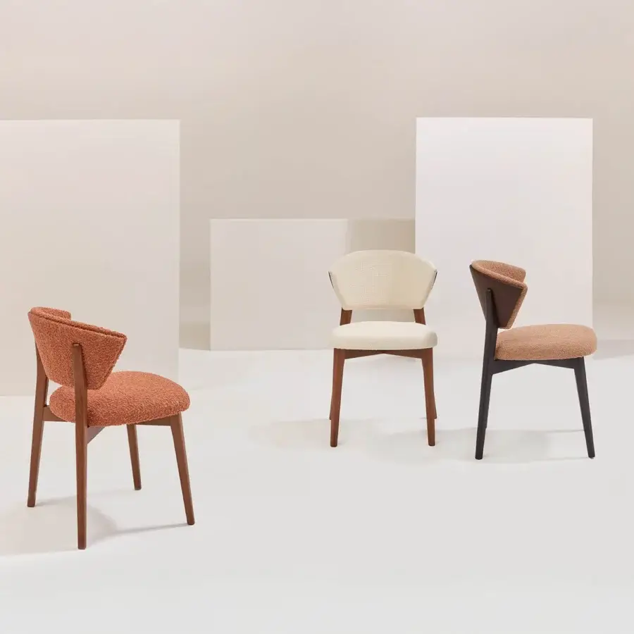 Sophisticated Billiani Stella dining chair with reddish-brown textured textile and smooth satin wood frame