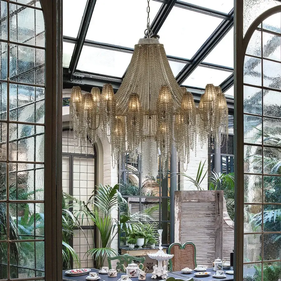 Superior Patrizia Garganti Burlesque chandelier with cascading clear glass beads and warm gold-toned metal accents