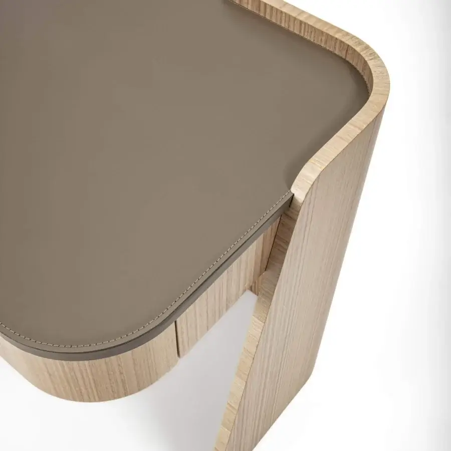 Exceptional Carpanelli Shape desk crafted in curved eucalyptus wood with a muted taupe leather top and satin sheen