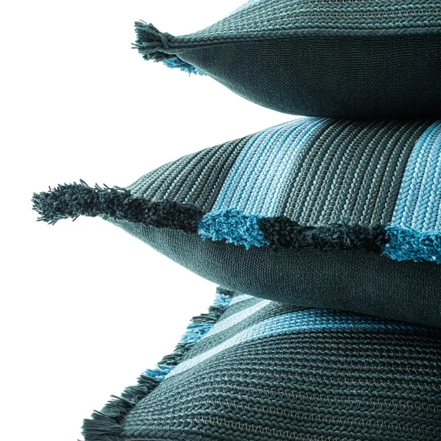 Distinguished Giorgetti Nisida cushion crafted with braided polypropylene technical yarn in alternating teal and turquoise hues with delicate fringe