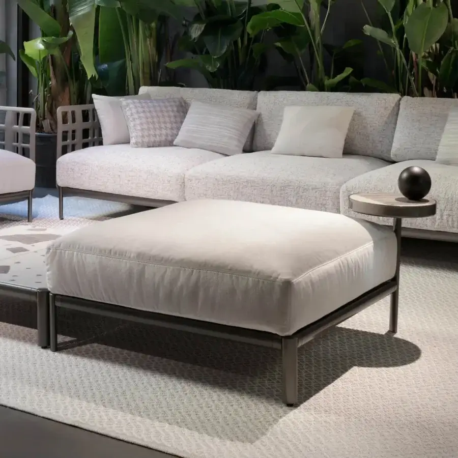 Distinguished Giorgetti Aldìa ottoman with waterproof fabric upholstery and a matte gray painted metal base