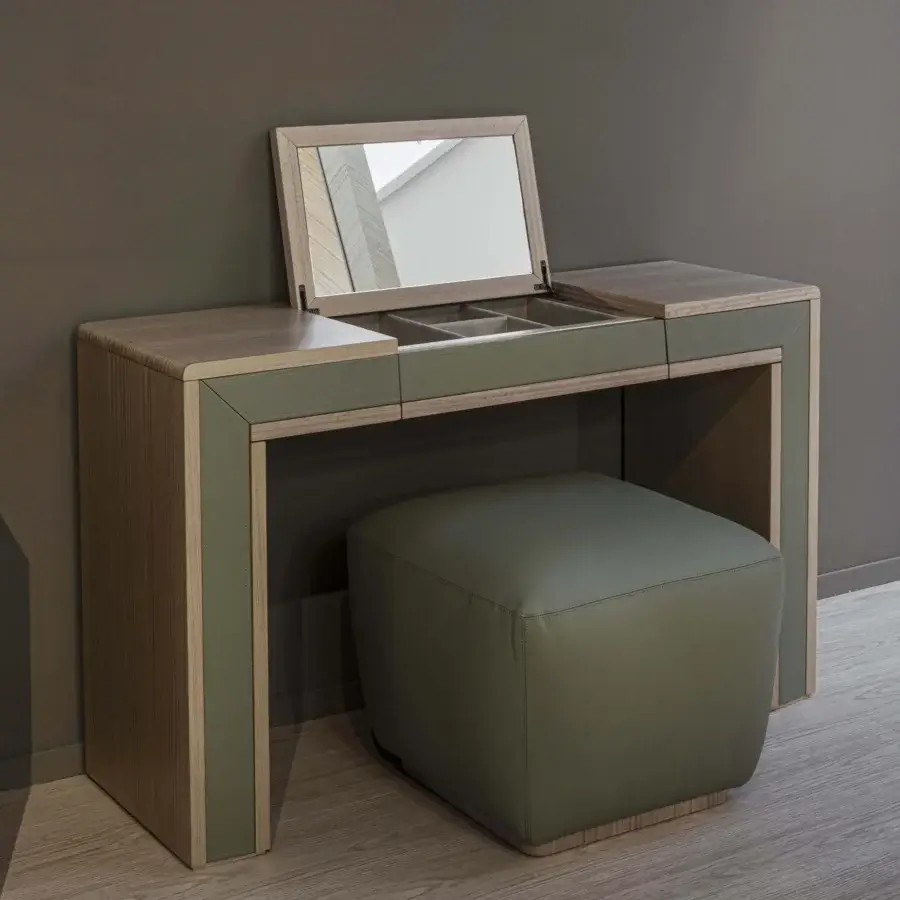 Elegant Carpanelli Galileo Lux vanity crafted in light neutral wood with muted olive green drawers and a cushioned stool in satin finish