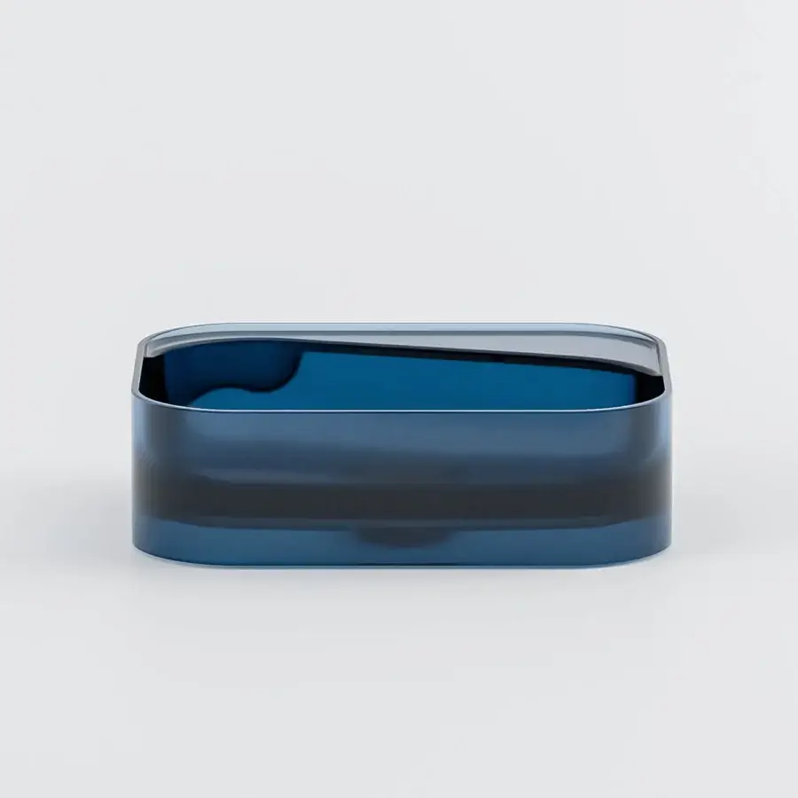 Avant-garde Norah Design ANBA 01 washbasin crafted in Norahcrystal with a glossy finish and deep blue hue