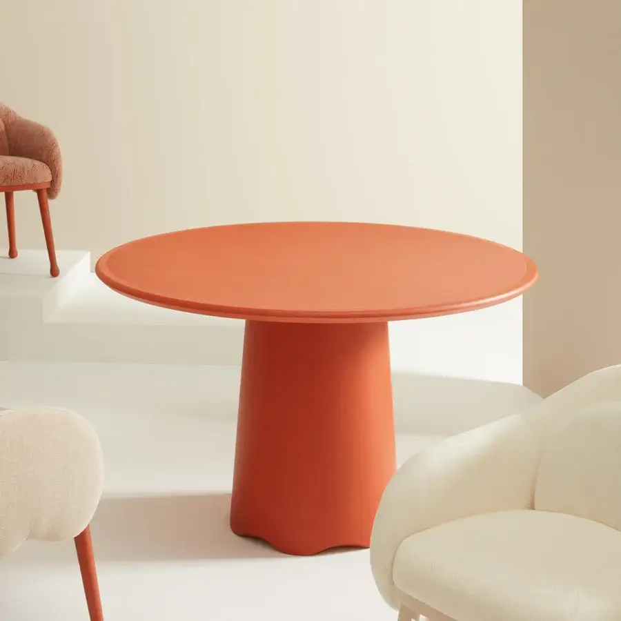 Elegant Billiani Corolla dining table in terracotta orange with worked wooden pedestal and smooth matte finish