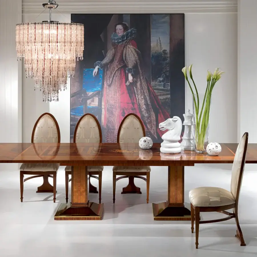 Exceptional Carpanelli Le Luci Della Ribalta extendable table with warm medium-toned brown wood, intricate fretwork and satin finish