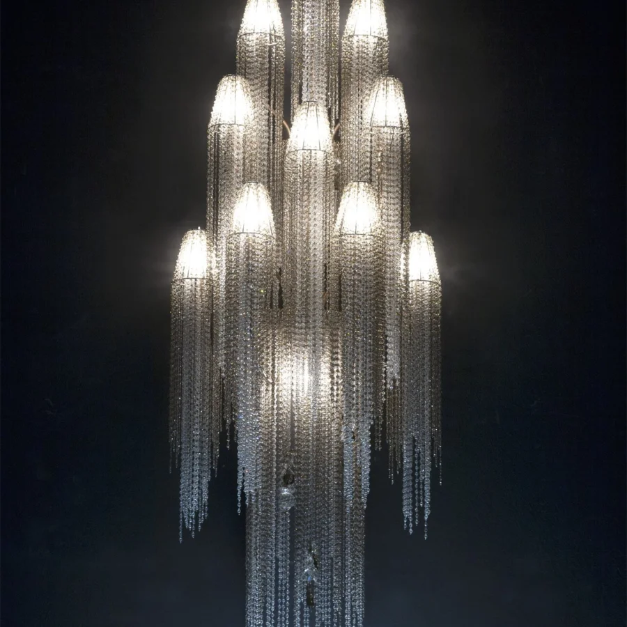 Distinguished Patrizia Garganti Burlesque EX wall lamp crafted in polished metal with cascading crystal strands evoking a theatrical presence