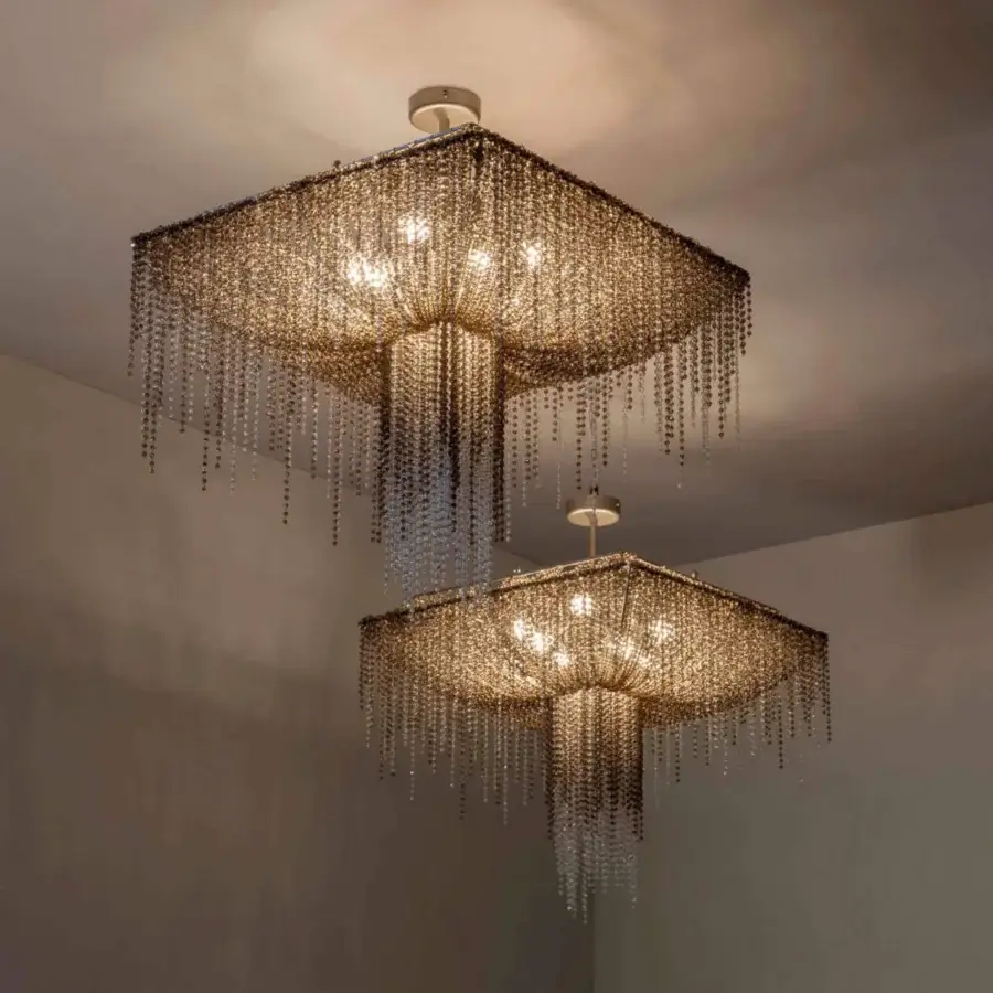Lavish Patrizia Garganti Burlesque EX square ceiling lamp crafted in warm gold-toned metal with cascading pearl strands