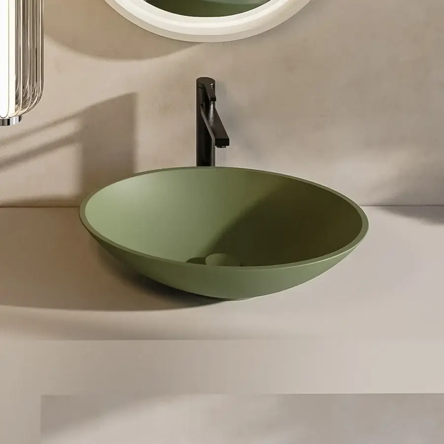 Superior Norah Design EYBA 01 washbasin sculpted from Norahcryl with a matte olive green finish and gentle oval form