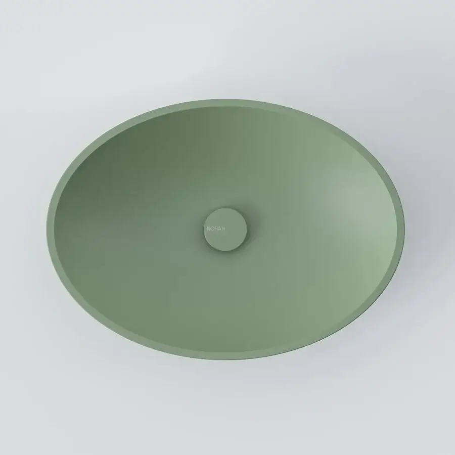 Superior Norah Design EYBA 01 washbasin sculpted from sage green Norahcryl with a sophisticated matte finish